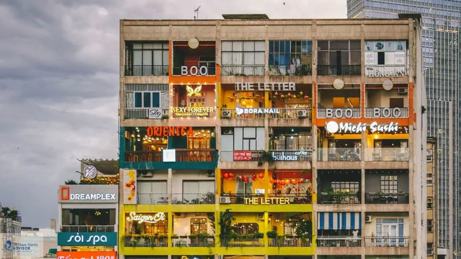 (Panorama of apartment building 42 with many cafes)